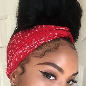high bun with scarf and laid edges