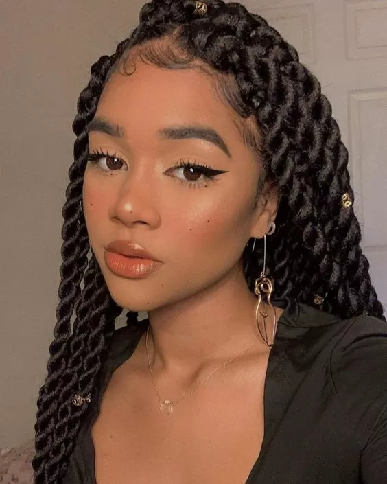 curly blond half up down sew in with feed in braids