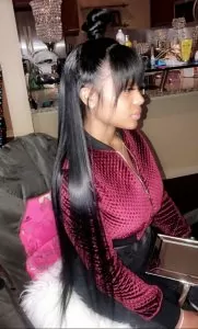 long half up half down sew in with straight bangs