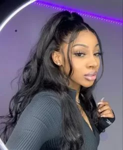 wavy half up half down sew in with dangling front pieces